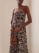 Fashionable Design Printed Backless Holiday Style Suspender Maxi Dress